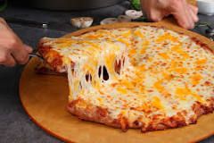 ¿Qué lleva la pizza de 4 quesos de Dóminos?
