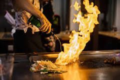 What happens at teppanyaki?