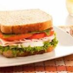 ¿Cuántas calorías hay en un sándwich de jamón y queso?