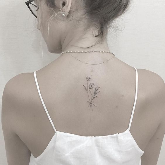 60 Inspiraciones para tatuajes femeninos en la espalda - 17 - enero 24, 2023