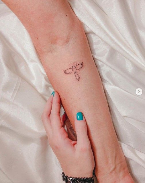 28 Ideas de tatuajes para expresar tu fe - 61 - enero 25, 2023