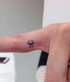 tatuajes carita feliz