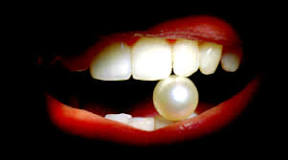 ¿Que figura literaria es las perlas de tu boca?